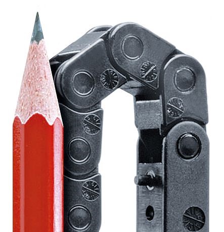 A miniature e-chain cable carrier, next to a pencil for scale