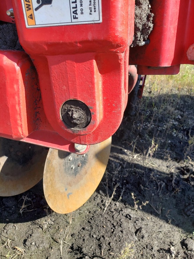 a corroded bearing point on agricultural machinery
