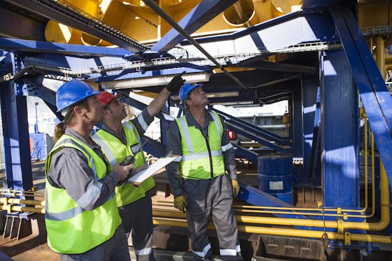 3 workers performing a crane inspection