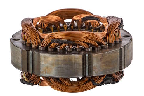 An electric motor stator on a plain white background
