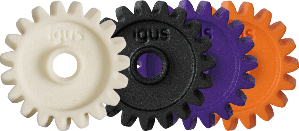 Four different 3D-printed igus gears aligned in a row