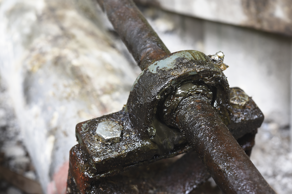A greased bearing point demonstrating the particle buildup that can occur.