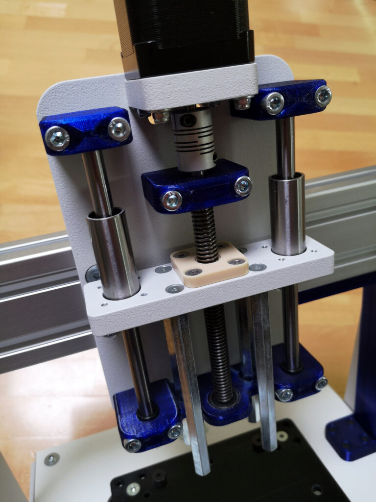 A vertical lead screw actuator within a real-world application