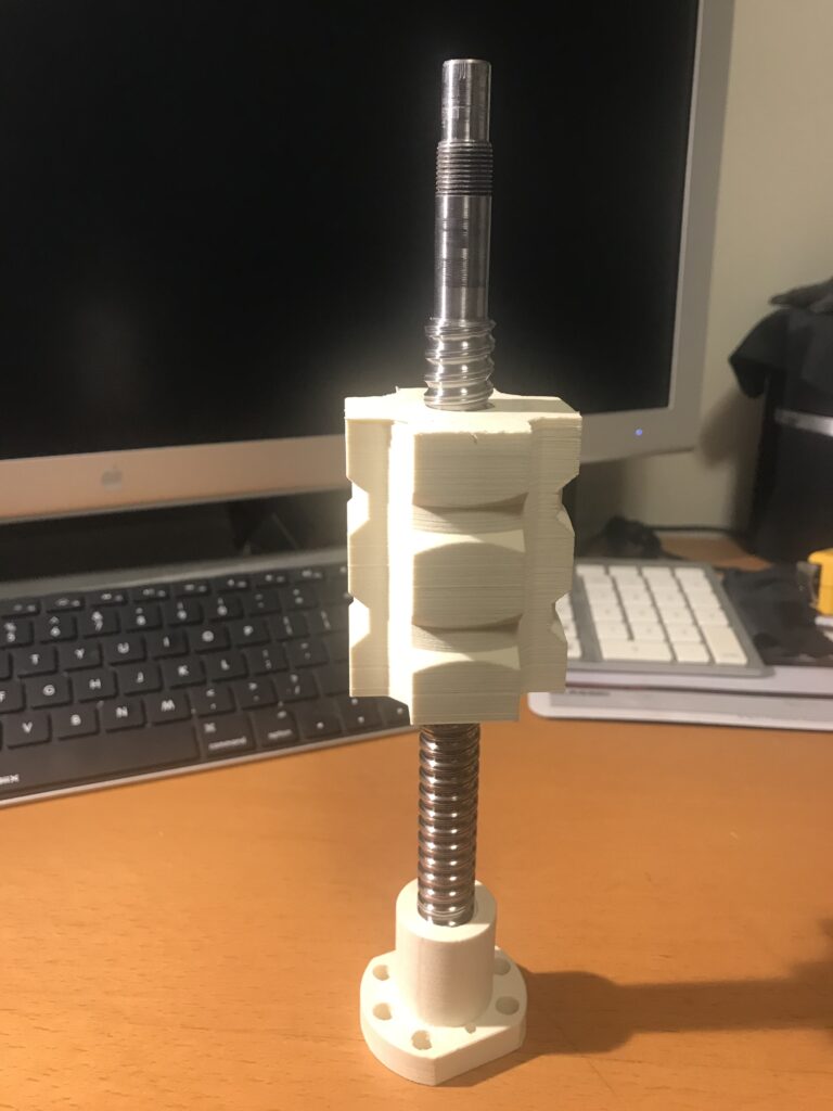 A vertical lead screw and nut demonstrating self-locking capabilities